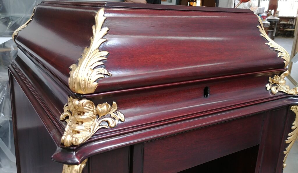 Gold leafing antique victrola furniture